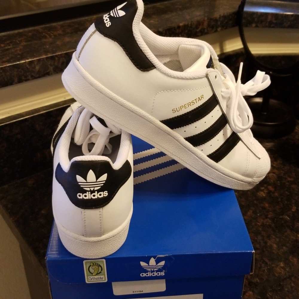 Adidas Suoerstar J white and black tennis shoes